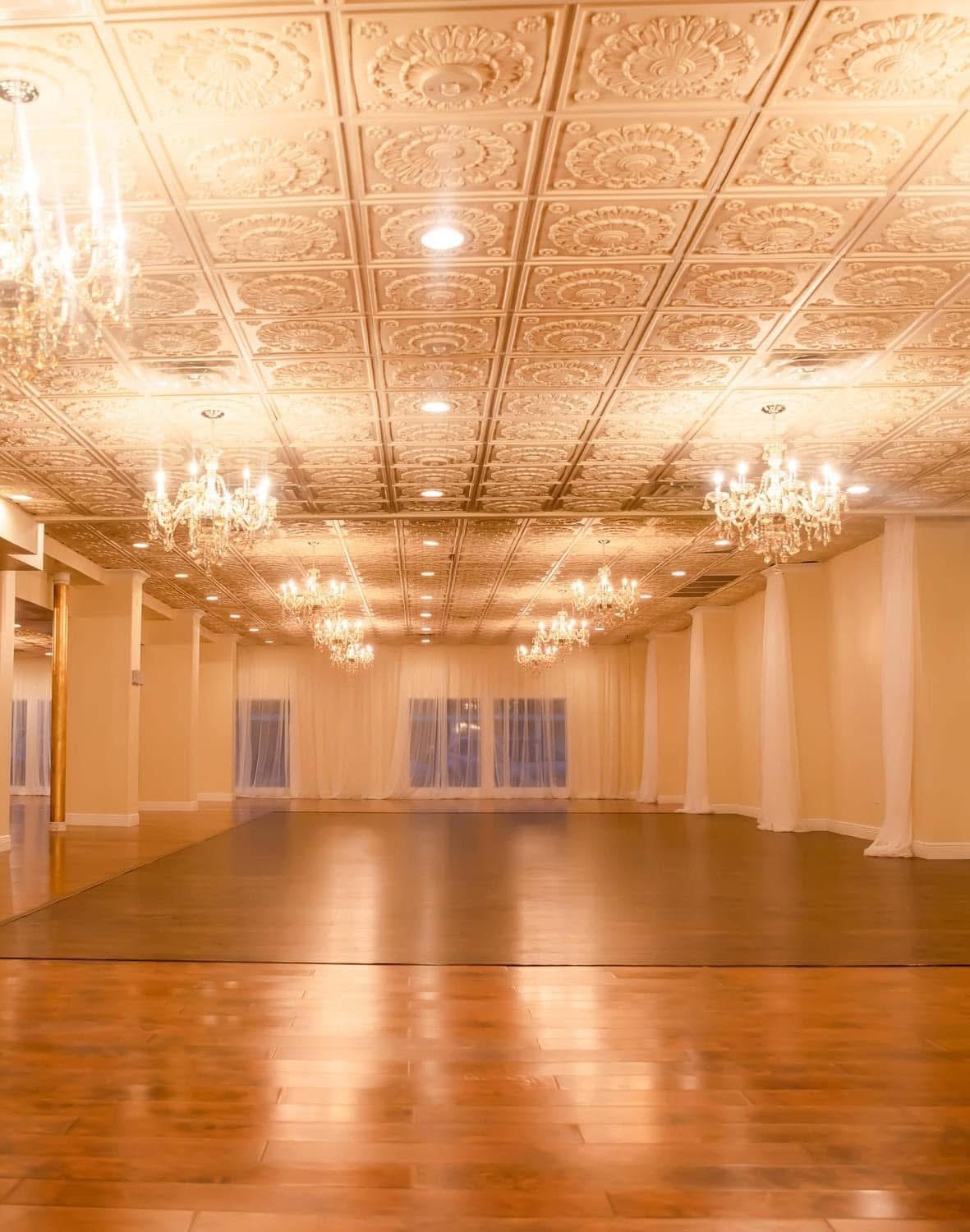 Maison D'Amis grand ballroom with chandeliers